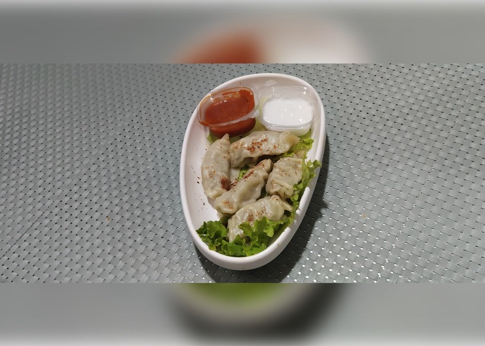 STEAM CHICKEN MOMOS